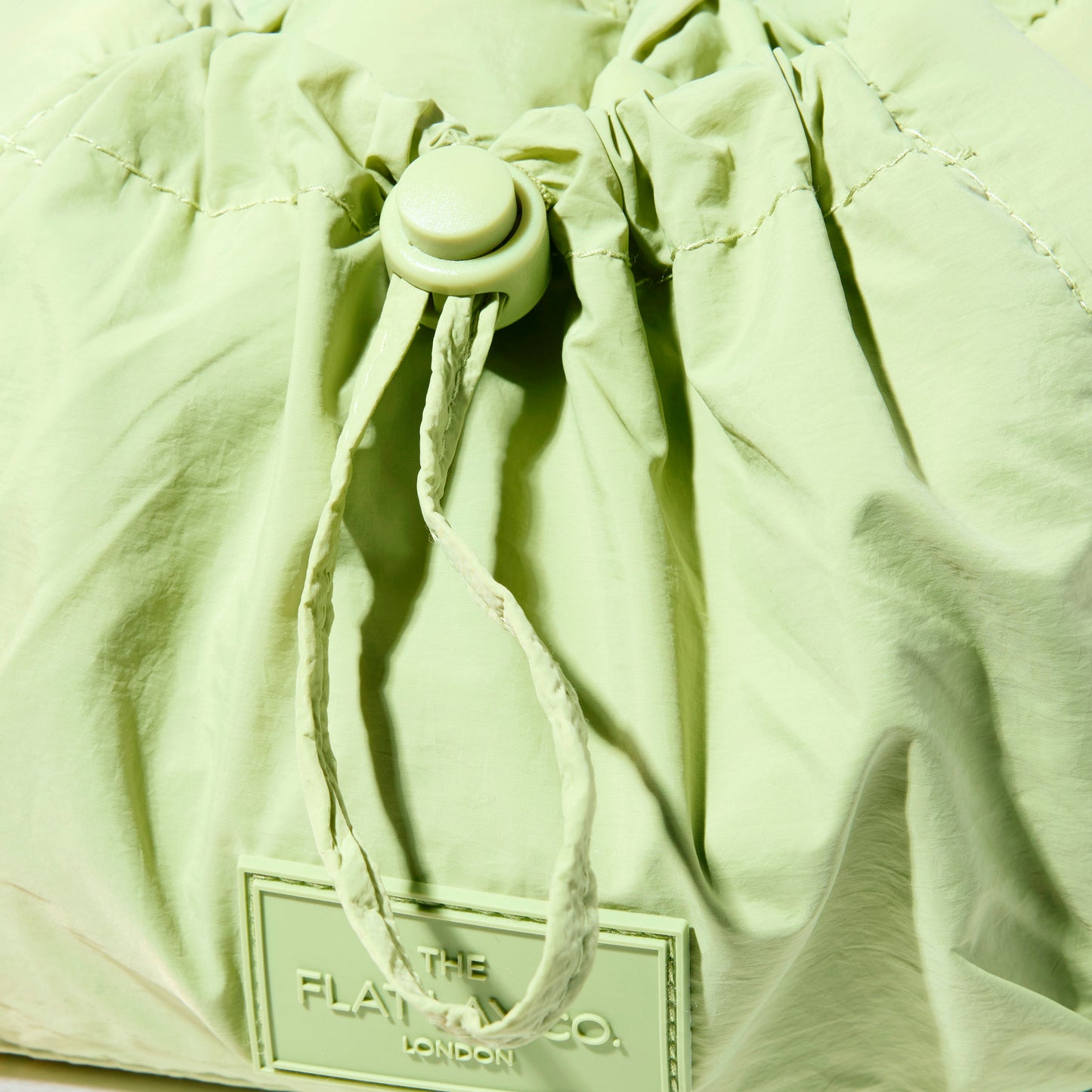 Green Parachute Drawstring Flat Lay Makeup Bag
