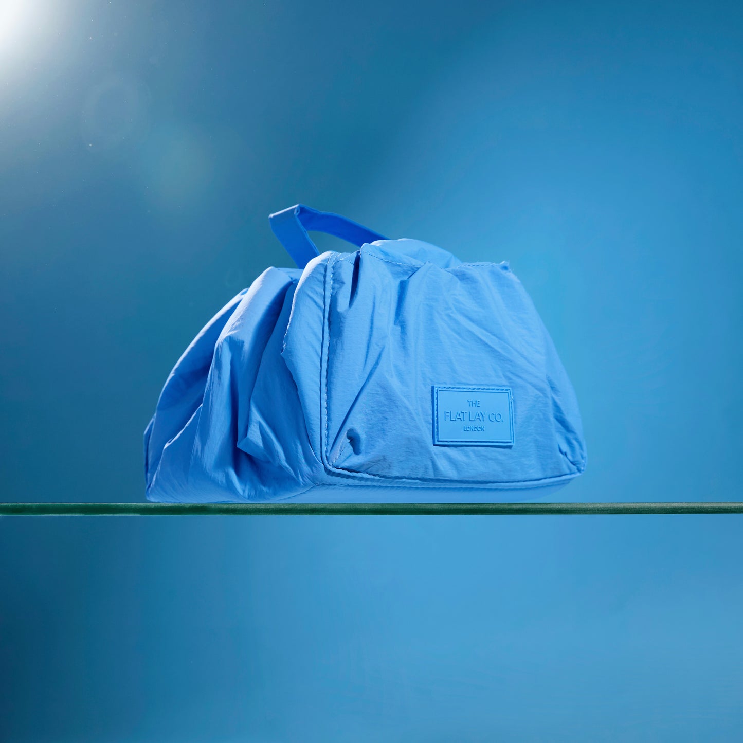 Blue Parachute Drawstring Flat Lay Makeup Bag