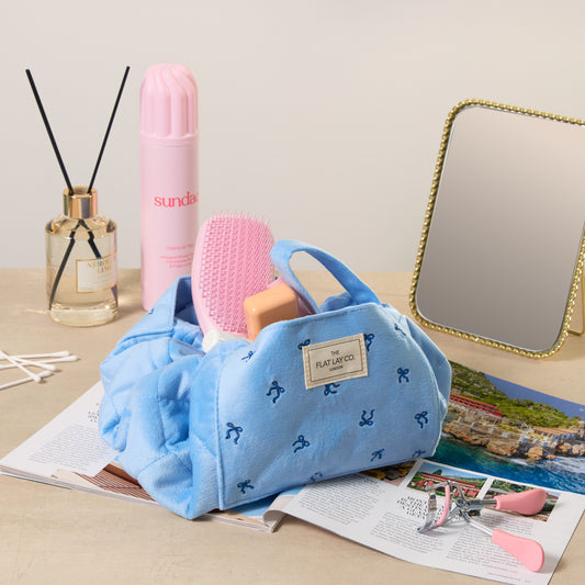 Drawstring Kosmetiktasche - Blauer Ditsy-Schleifen Samt